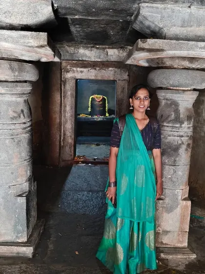 Inside an ancient stone temple, feeling the divine presence of Shiva.