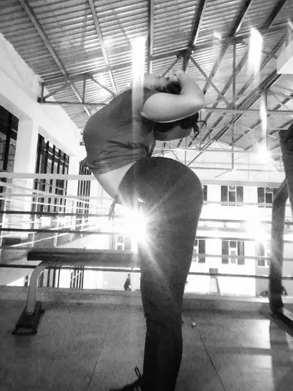 The same backbend with a sun flare, capturing the energy of the moment. Flexibility training is a journey of patience and listening to your body's limits.