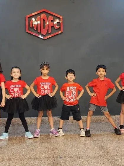 Our Summer Camp stars posing with confidence. Our camps are designed to be a productive and energetic experience, culminating in a showcase performance.
