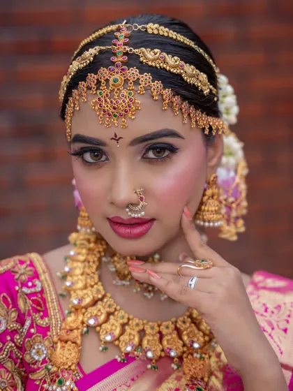 A close-up from a student's portfolio shoot, focusing on a high-definition South Indian engagement look. Notice the sharp, clean lines of the eye makeup and the smooth base, skills we focus on perfecting in my Probatch.