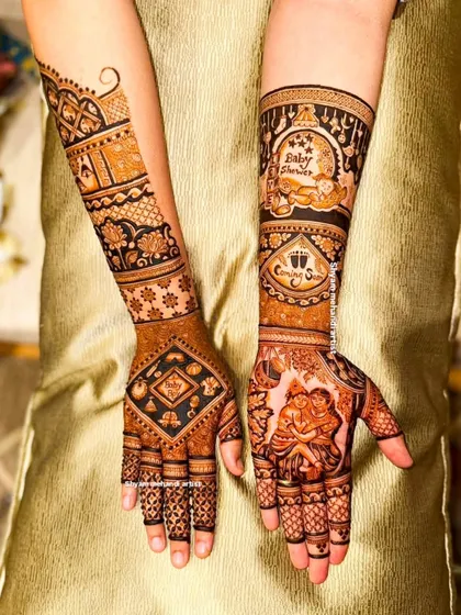 A beautiful mehandi design created specifically for a baby shower, with "Baby Shower" and "Coming Soon" artfully written into the pattern.