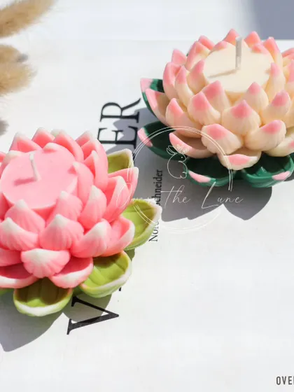 Both of my new Lotus candle designs side-by-side. Whether you prefer the softer pink-tipped version or the more vibrant pink, both are designed to bring festive warmth and charm to your home.