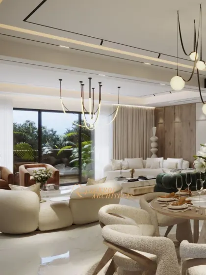 An open-plan living and dining area designed with soft, neutral tones and natural textures. The space feels warm and inviting, with comfortable seating and modern lighting.