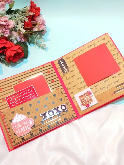 Another page from the Valentine's scrapbook, with pockets and tags for messages.