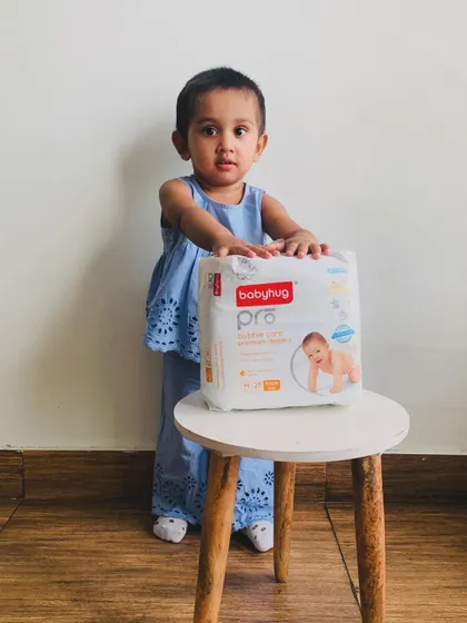 Here is my daughter with her favorite Babyhug Pro diapers. They have been a lifesaver, offering great comfort and absorbency. I always share discount codes with my followers to help them get the best deals.