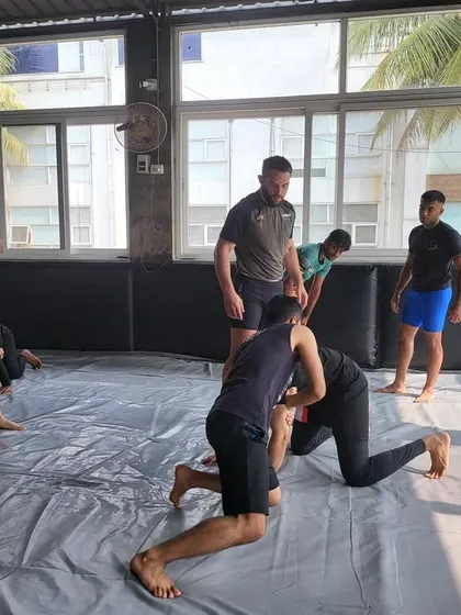 A typical seminar scene at our institute. Students are focused and engaged as a guest instructor breaks down a technique. The environment is built for serious learning and skill acquisition.