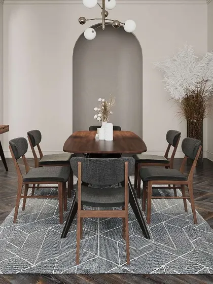 Discover refined dining with the Crimson Dining Set. The table, made from American Walnut veneer with solid tropical wood legs, is paired with cozy upholstered side chairs, creating a dining space that is both inviting and stylish.