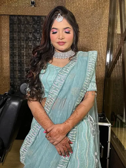 Engagement ready in a beautiful light blue lehenga. I gave her a pop of pink on the eyes to add a touch of fun to her otherwise soft and elegant look.
