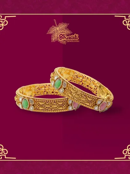 A beauty of antique gold with temple and diamond work. This pair of kadas offers a perfect fit for every hand, blending divine motifs with the sparkle of diamonds for a timeless appeal.