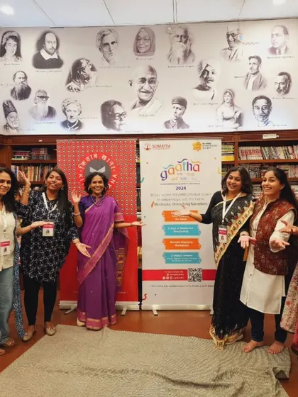 A group of us storytellers at the Gaatha festival, in a room filled with books and portraits of great writers. It feels like we are standing on the shoulders of giants, continuing a long and beautiful tradition.