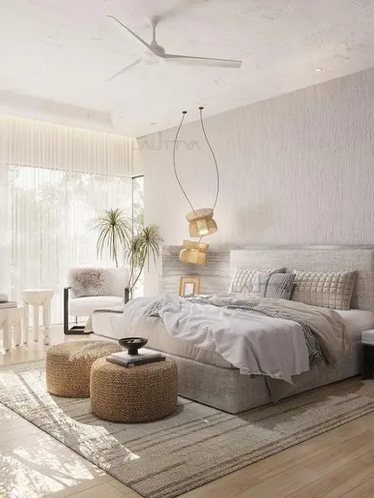 A beautifully appointed bedroom showcasing our signature style of quiet luxury. This space combines layered textures, a soothing color palette, and bespoke furniture to create a personal sanctuary for rest and relaxation.