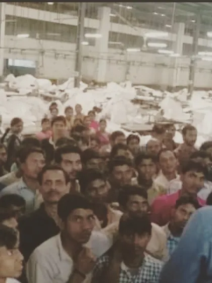 Factory workers gather for a conversation in Vapi about making surroundings more beautiful and hygienic, part of our Mission India Beautification story.