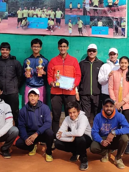 The entire team celebrates the success of our players, including a runner-up finish in a Men's doubles tournament in Jalandhar.