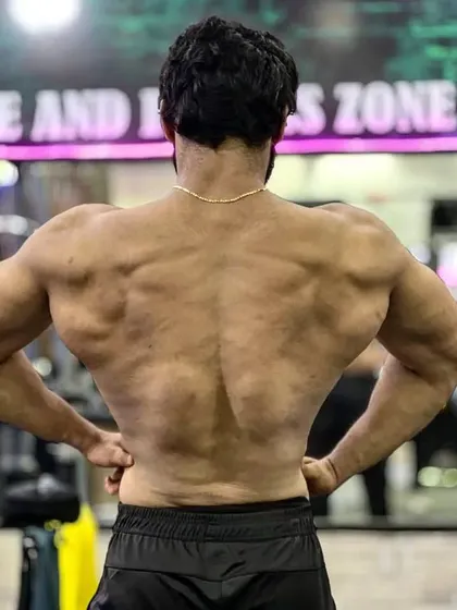 A back shot showing my lat spread and lower back definition.