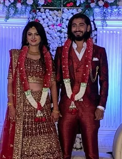 Vikas and Apoorva in their stunning wedding reception attire. I am happy to have matched this lovely couple.