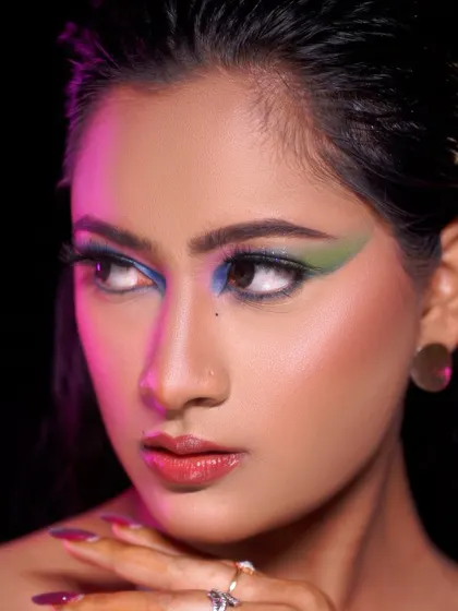 A creative editorial look with graphic colorful eyeliner. This is the kind of artistic expression we encourage and teach in our advanced courses.