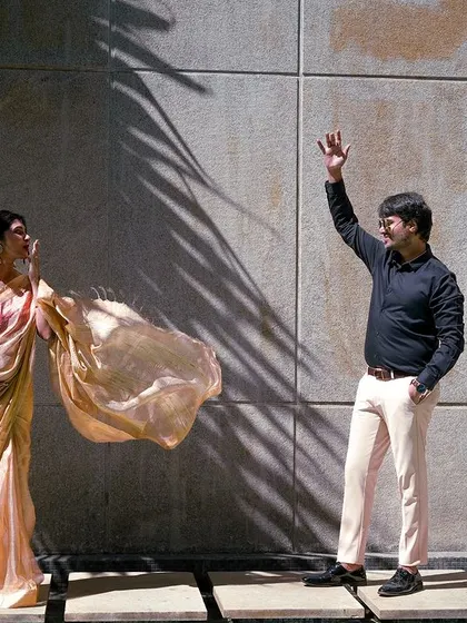 A duplicate of image 38, this photo showcases a lighthearted and happy moment during the maternity session.