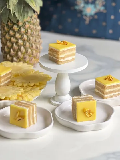 Here’s a closer look at the pineapple opera gateau from my Rakhi collection. You can see the delicate layers of almond sponge and pineapple cream, all made with 100% eggless ingredients.
