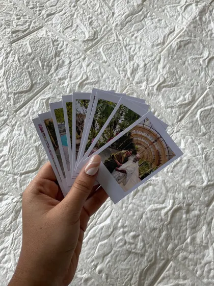 A closer look at my aesthetically pleasing Polaroid prints, fanned out to show the quality and vibrant colors. These are perfect for creating a photo wall or a memory journal.