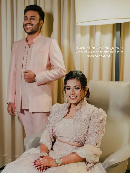A symphony of elegance. This engagement portrait captures the couple in their stunning pastel outfits, looking like a masterpiece of style and grace.