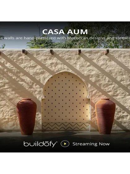 The home's walls are hand-plastered with Moroccan-inspired designs, a testament to our commitment to craftsmanship and artistic detailing.