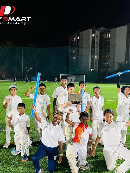 The victorious U12 team celebrating after a win. Regular match practice is key to their continuous improvement and success.