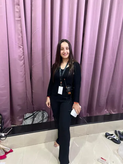 A behind the scenes photo from the Choreofeast awards night, ready with my walkie-talkie to manage the show.
