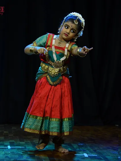 One of our youngest performers, capturing the essence of Bharatanatyam with her expressive eyes and graceful posture at Nritya Sanje.