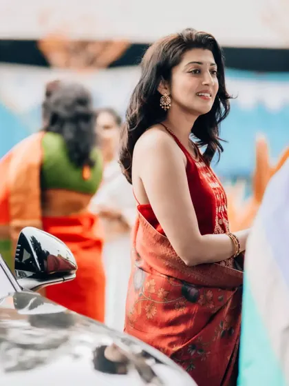 A candid portrait of actress Pranitha Subhash at an event. This shot captures her natural grace and radiant smile in a real-world setting.