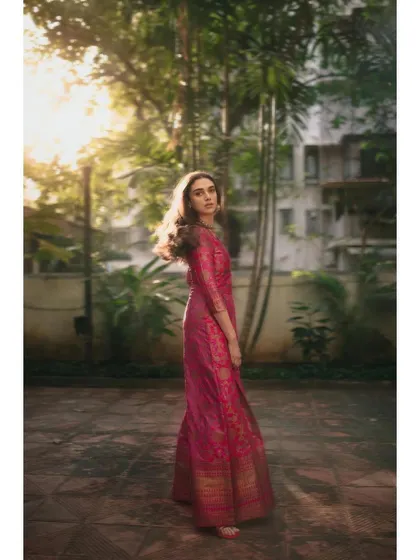 The sunlight catching the beautiful texture of the brocade fabric. This is how you make a statement with fusion wear.