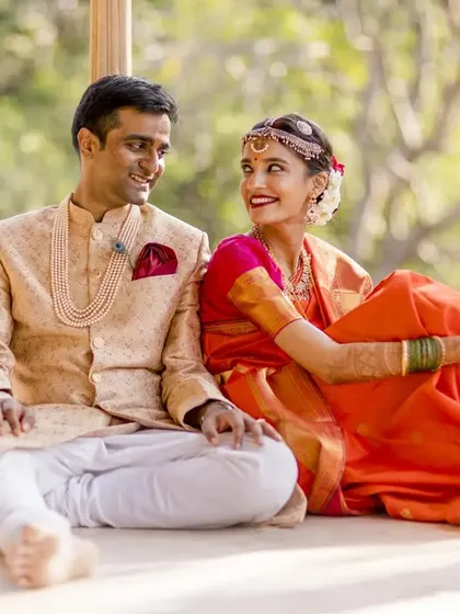 A beautiful, sunlit moment from a South Indian wedding. The genuine smiles and relaxed posture show a couple completely at ease. My goal is to create a comfortable space where your natural connection can shine through.