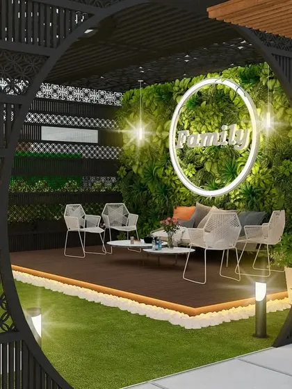 A 3D render of a terrace with a circular CNC-cut screen framing a seating area with a "Family" sign on a green wall.