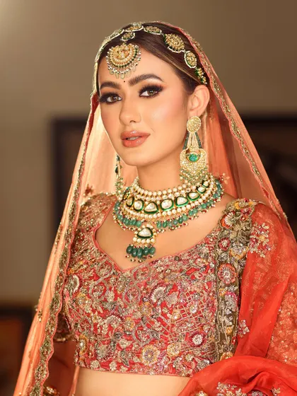 A classic bridal pose. The makeup is designed to look perfect from every angle, ensuring you are picture-perfect throughout your wedding day.