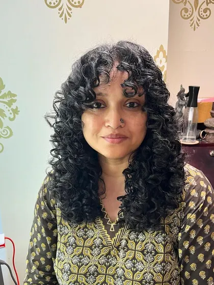 Shivali looking confident with her fresh curly haircut.