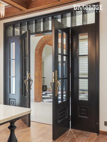The doors open to reveal a glimpse of the magnificent interior, with our Emperor handles serving as the formal introduction. This view shows how hardware can connect the exterior statement with the interior design story.