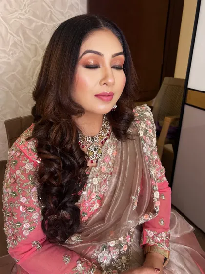 A close-up with eyes closed to showcase the seamless blending of the eyeshadow. This creates a sophisticated and polished eye makeup look.