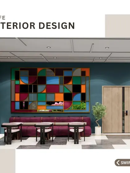 This section of the cafe features a long magenta sofa set against a dark teal wall with a vibrant, abstract art piece. This combination of color and art creates a perfect photo opportunity, turning a corner of the cafe into a shareable brand moment.