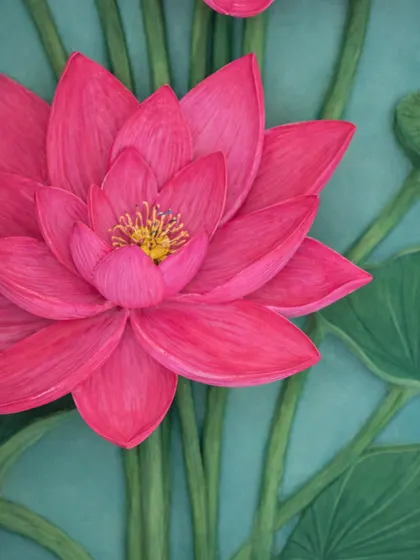 A close up view of the hand sculpted and painted lotus petals. Each petal is individually shaped and textured using ceramic paste to capture the delicate form of the flower, showing the level of detail that goes into every mural.