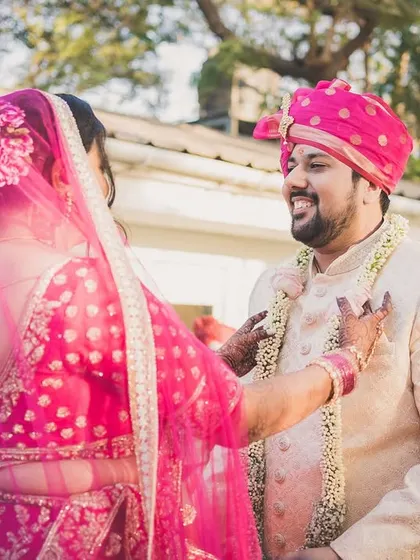 A playful and happy moment during Arjun and Nerrisa's Varmala ceremony.