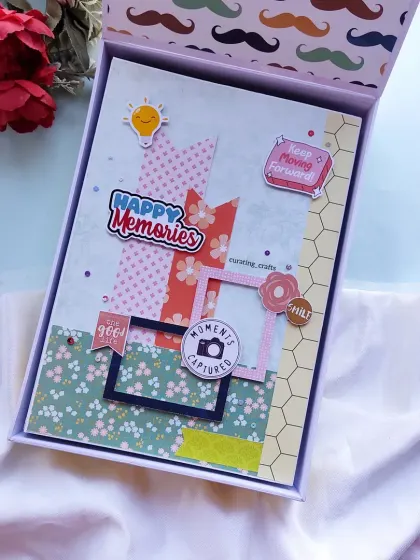 The A4 farewell scrapbook comes in a matching gift box, with a fun mustache pattern on the inside.