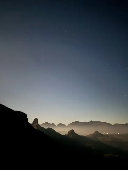 The silhouette of the Sahyadri peaks against the pre-dawn sky. This is the reward for an early morning start on the Ratangad trek.