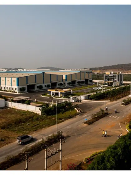 We approach industrial projects with a focus on cohesive master planning. This view of the Krishna Sai Granites campus shows how we integrate multiple processing units, an administrative block, and ancillary buildings across a 9.5-acre site to ensure logical flow and a unified architectural language.