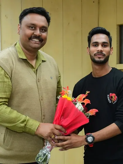A male instructor from my team being honored at the university workshop. We train both men and women to be protectors and leaders in their communities.