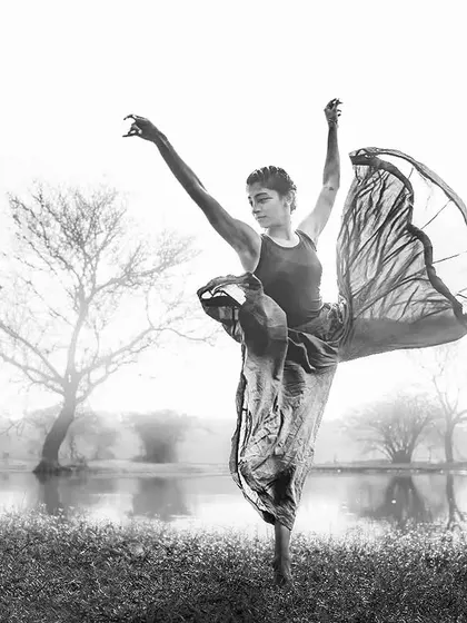An explorer of movement. This black and white shot captures the feeling of contemporary dance, a powerful form of expression.