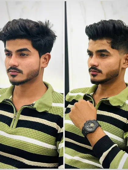 A front view of the modern mullet transformation. The new style is sharp, confident, and on-trend, showing off his watch and his new look.