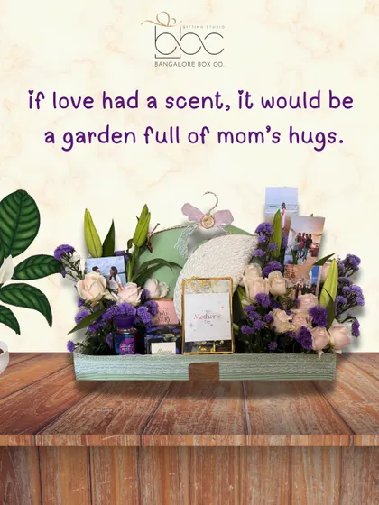 If love had a scent, it would be a garden full of mom's hugs. This stunning tray is filled with personalized photo frames and fresh flowers, creating a beautiful tribute to a mother's love.