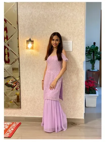 Another view of the beautiful lilac sharara set, showing its flattering silhouette and the elegant flow of the georgette pants.