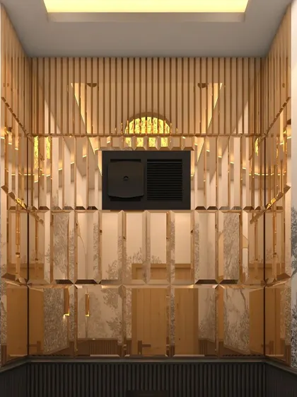 An interesting design element featuring beveled gold mirror panels and wooden louvers conceals the ventilation unit.