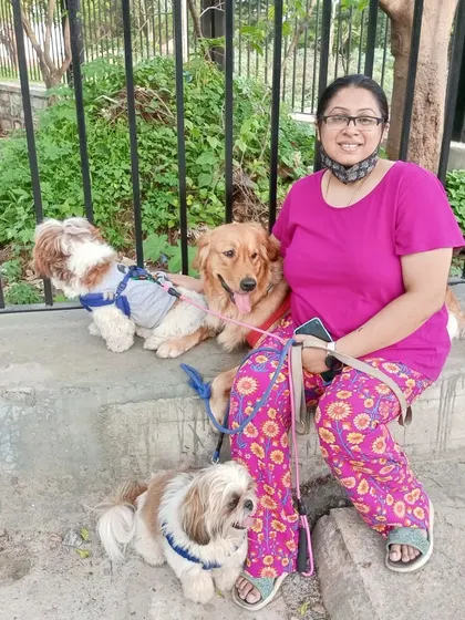 Ramya taking a short break during a walk with a few of the kiddos. We love spending quality time with them outdoors.