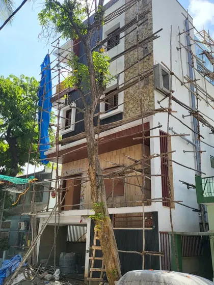 A wider view of the site, showing the building with scaffolding. This demonstrates our hands-on approach to project execution.